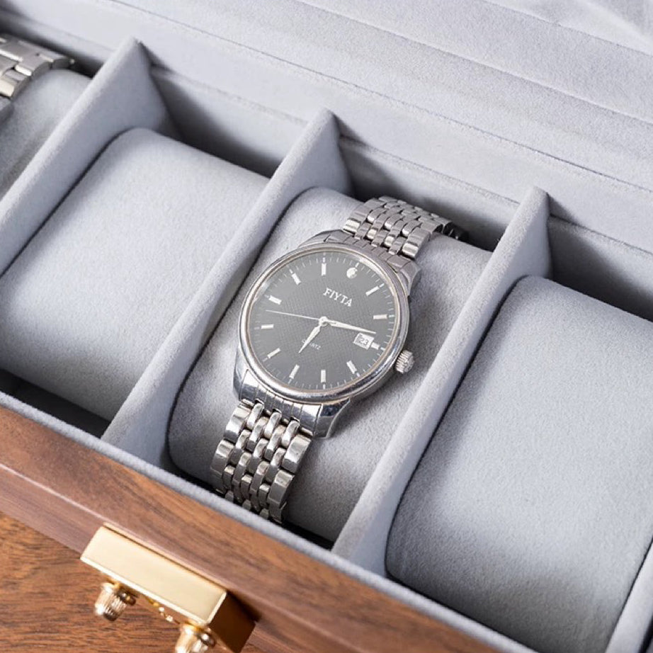 Vera walnut watch collection box on dresser